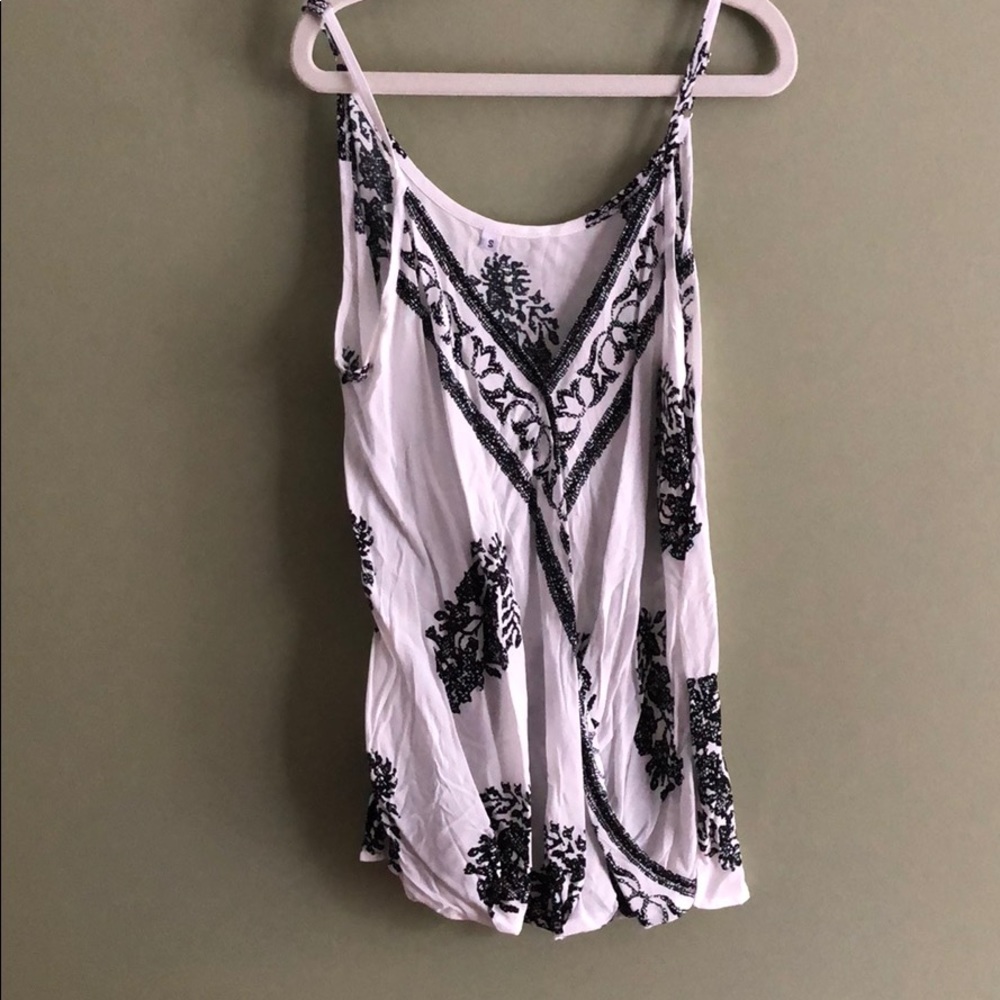 White and black wrap style tank